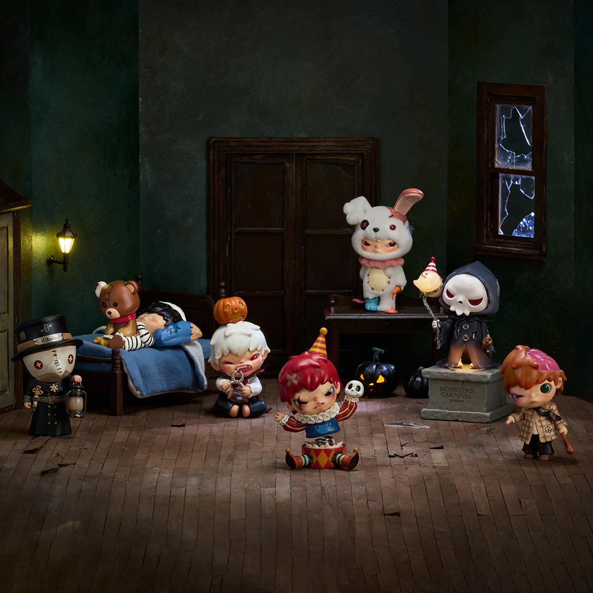 Hirono Monsters' Carnival Series Figures - Preorder: A diorama of seven creepy-cute vinyl figures in a dim, eerie room, echoing a haunted toy workshop.