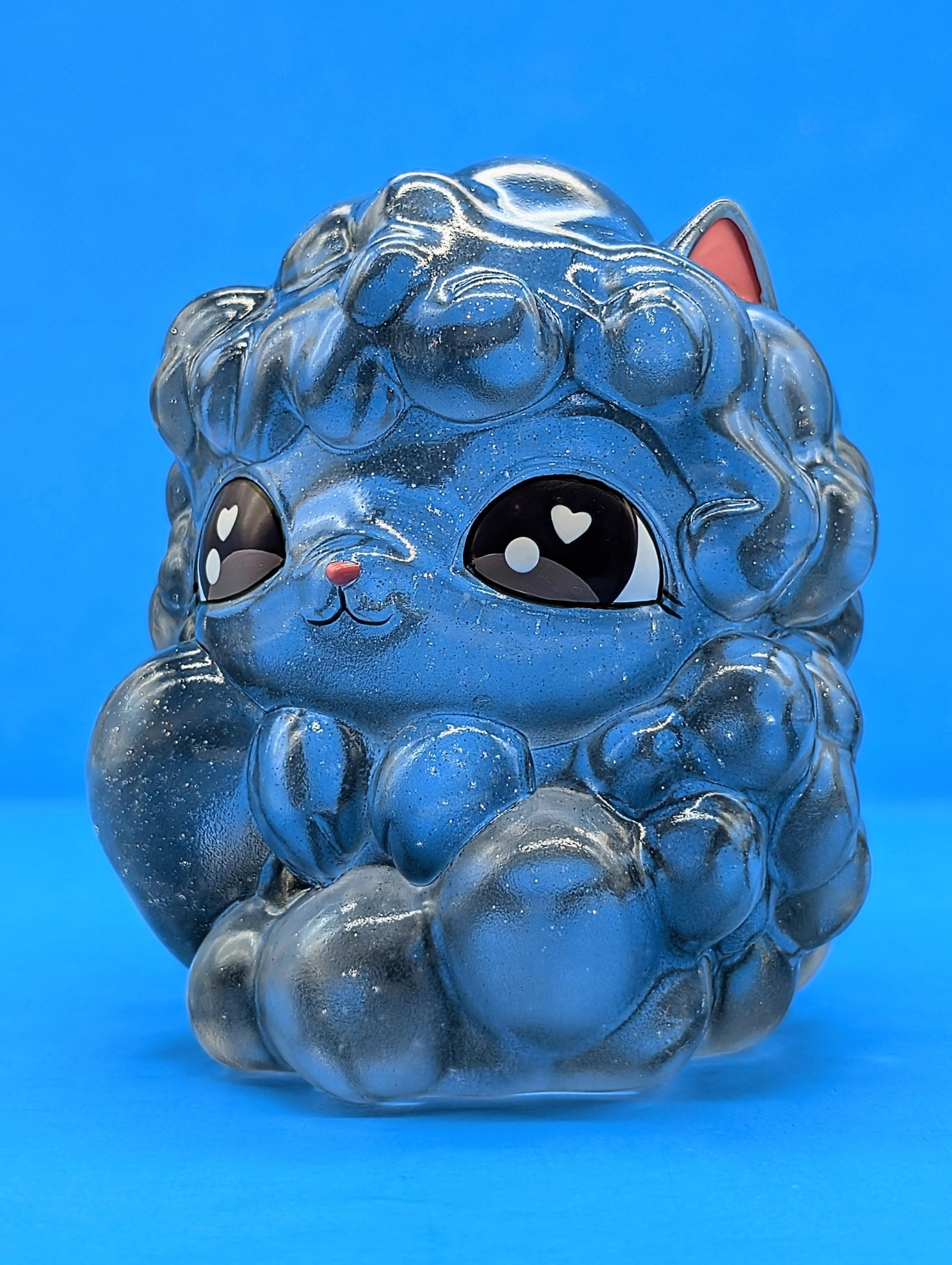 Kumo Kitty - Stormy Skies figurine: a 4-inch stylized vinyl collectible with metallic curls, big cartoon eyes, and cat features, perfect for art toy enthusiasts.