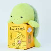 Green plush Posture Pal hugging box with Japanese text, featuring Marine series. Ideal for desk posture, including Lobster, Turtle, Whale, and Walrus.