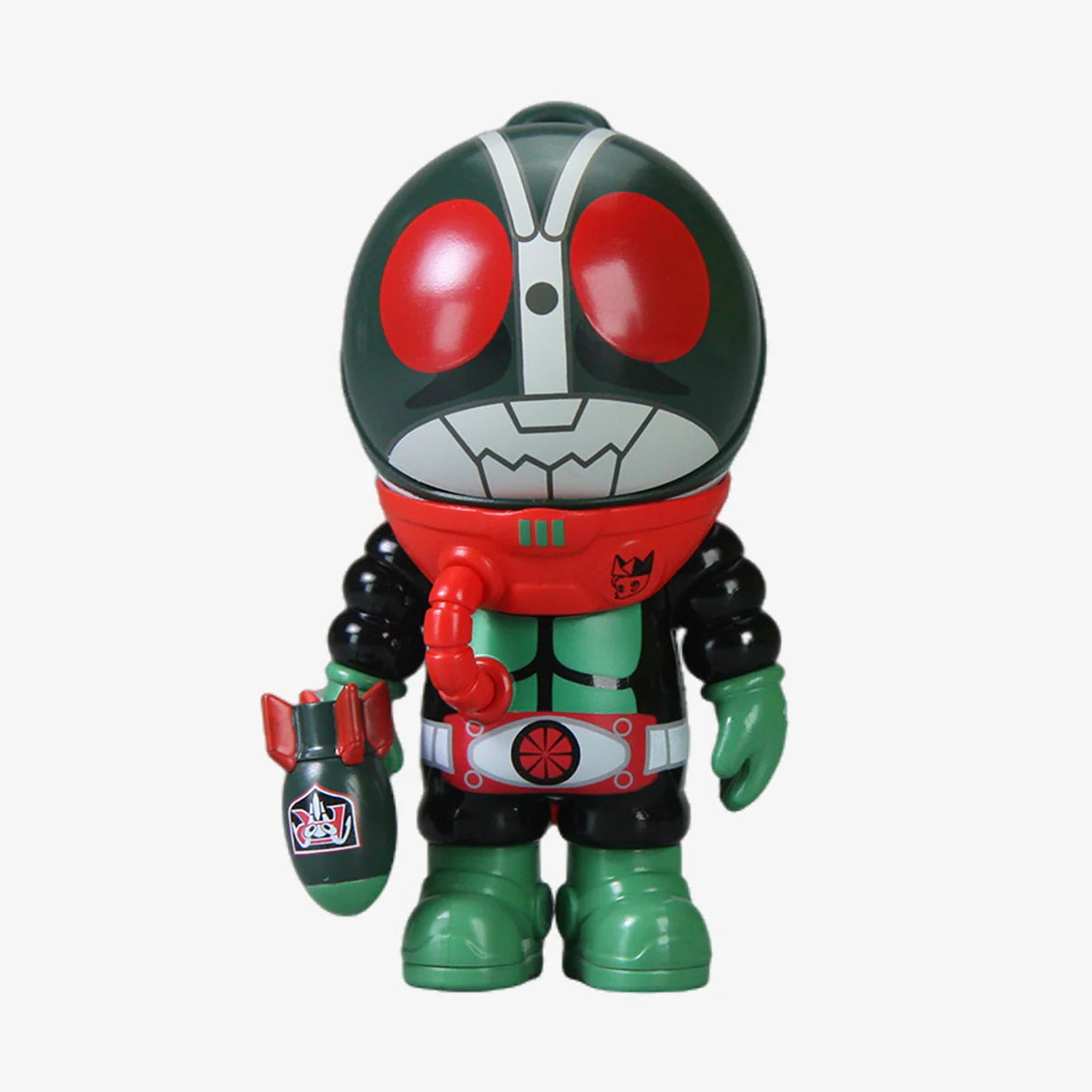 SAMSAM ADVENTURER X KAMEN RIDER BLIND BOX: Vinyl toy with masked-rider look, red eyes, green limbs, holding bomb prop. Collectible with 8 designs and 2 secrets.