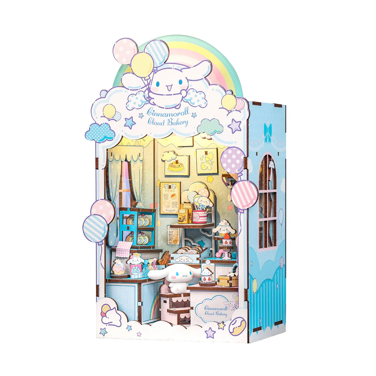 Cinnamoroll Cloud Bakery diorama featuring Cinnamoroll in a tiny bakery with pastries, cloud motifs, and rainbow canopy. Includes LED light and figurine.