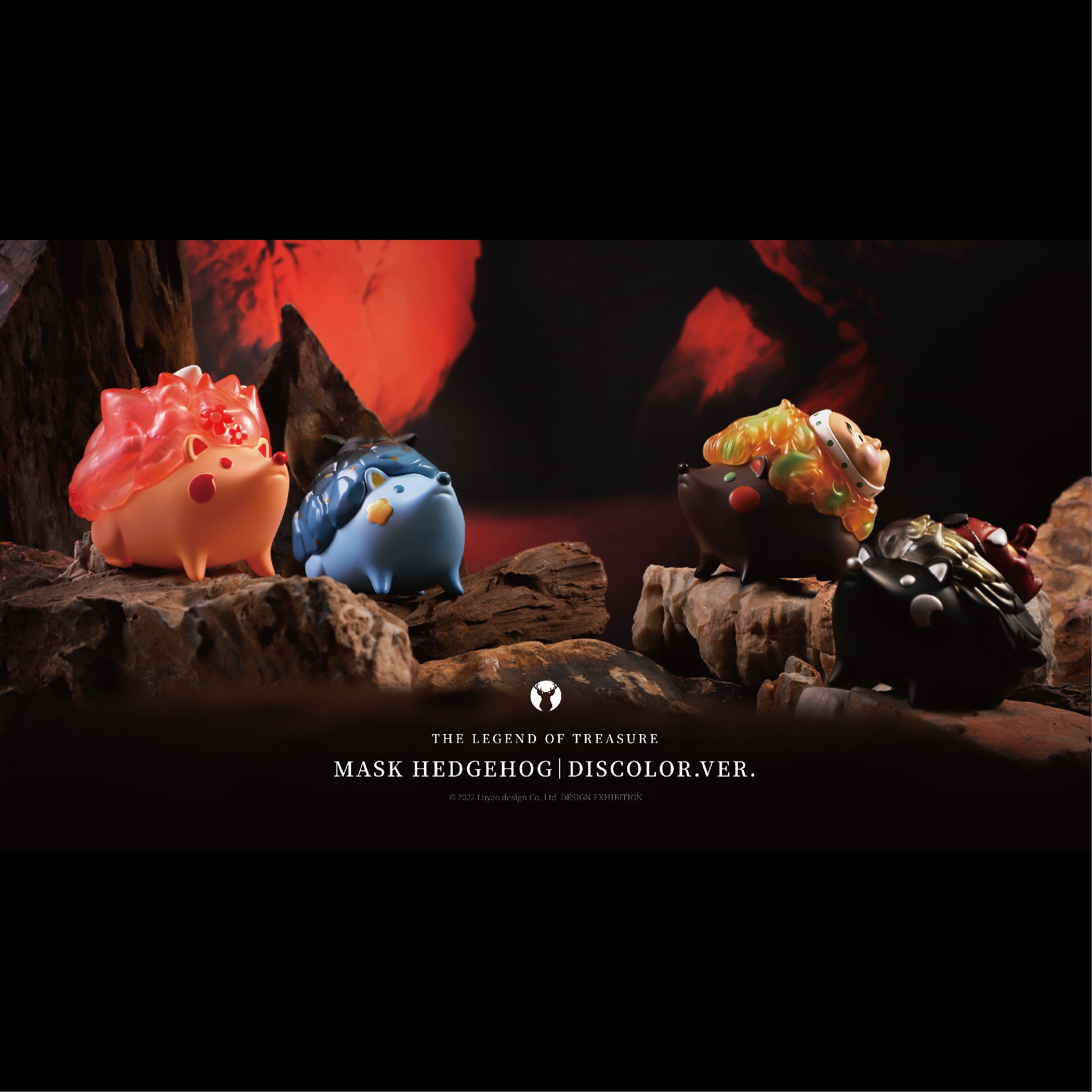 A group of small vinyl toys including Mask Hedgehog-Discolor ver. on rocks.