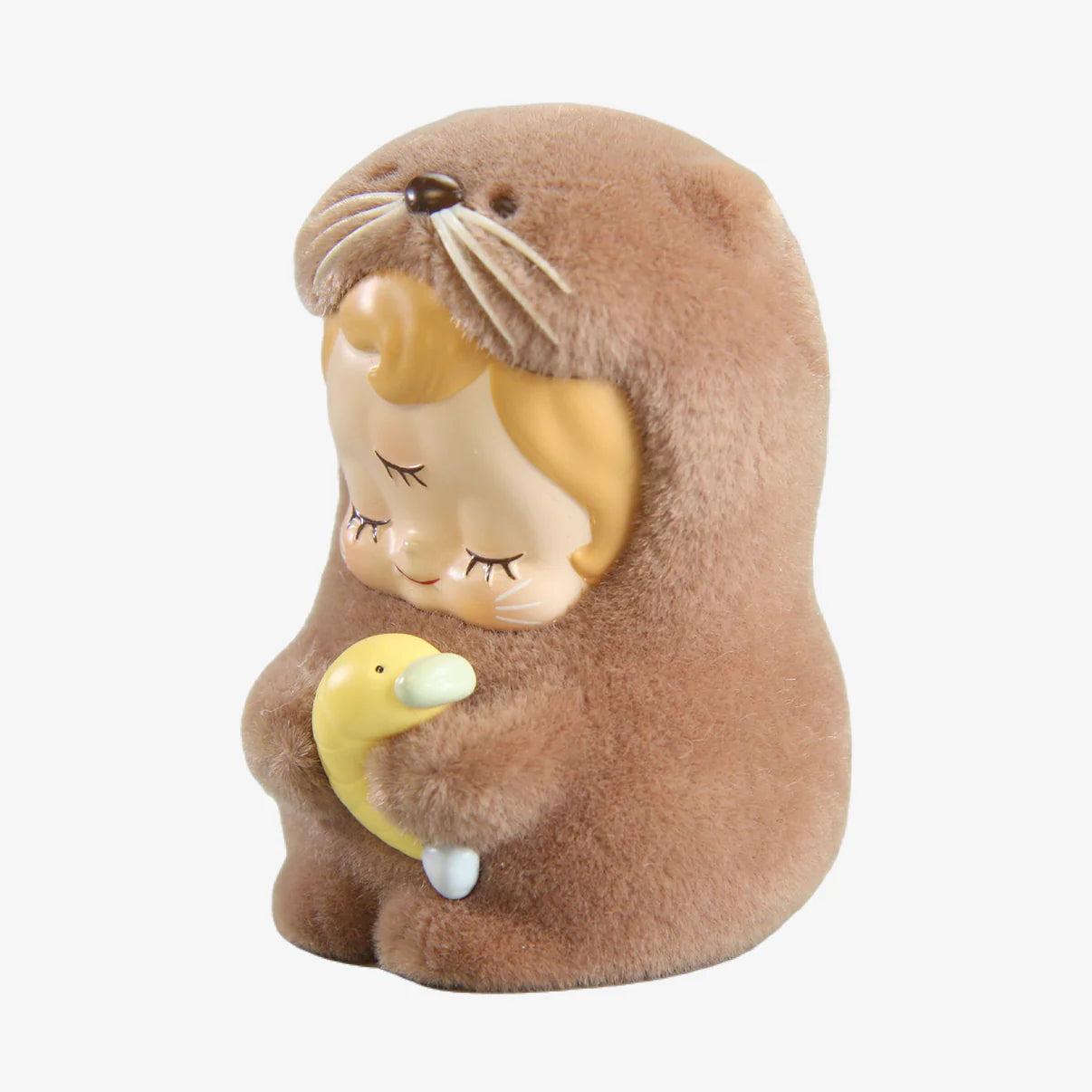ABAO-Otter baby dede figurine, a 7.5cm resin and flocking piece, depicts a child-like character in an animal suit hugging a duck. Preorder now.