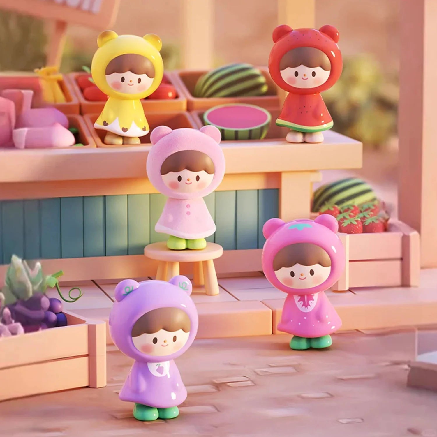 Five fruit-themed figures from the zZoton Joy In A Twist Uliuli Mini Series Blind Bag displayed in a playful toy-market scene with pastel styling.