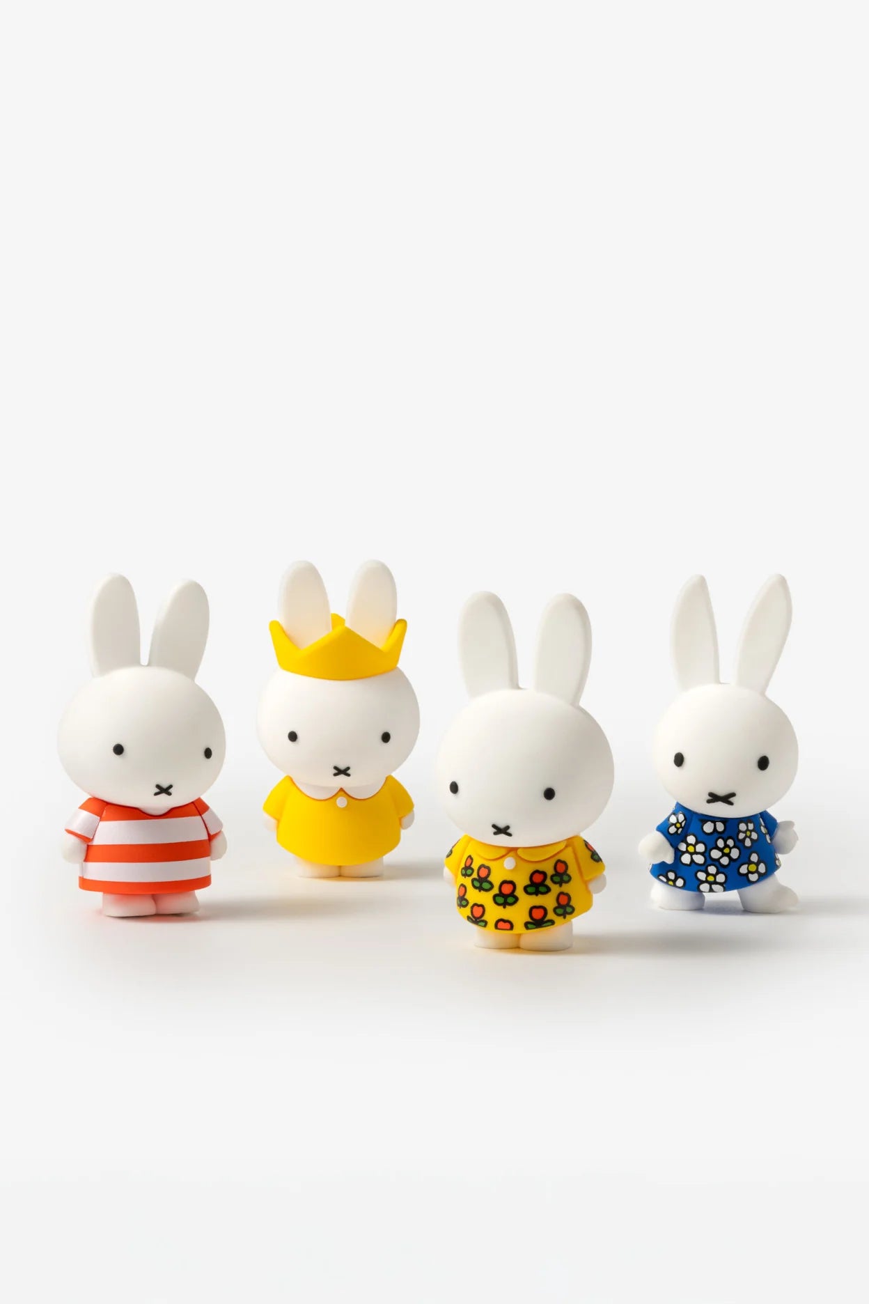 Smoko Miffy Dressing Up Blind Box Figure set, featuring four vinyl rabbit figurines in various outfits, each with simple facial expressions and upright ears.