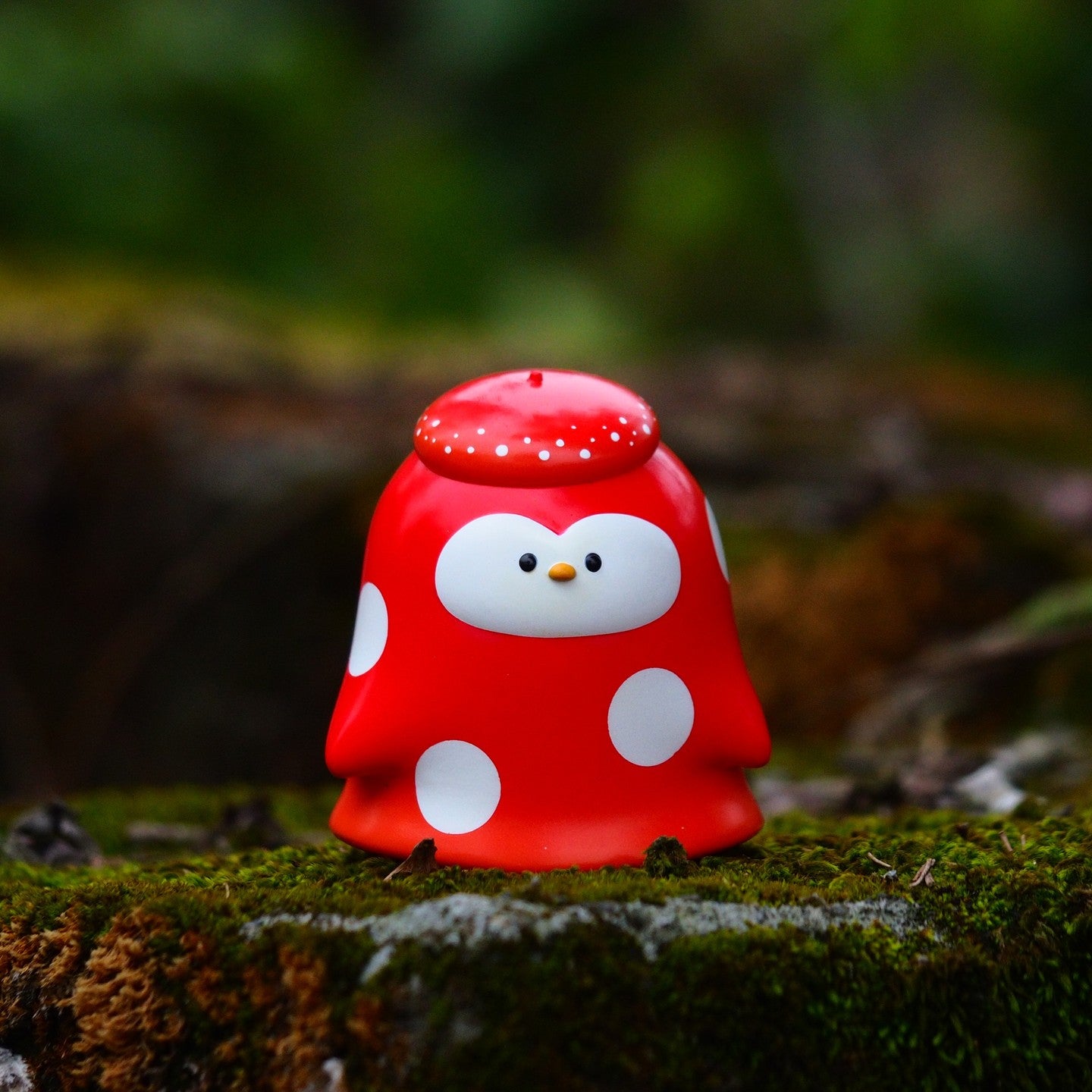 Alt text: Mushroom Umi toy, a red and white penguin figurine made of soft vinyl, 8.5 cm tall, available for preorder at Strangecat Toys.