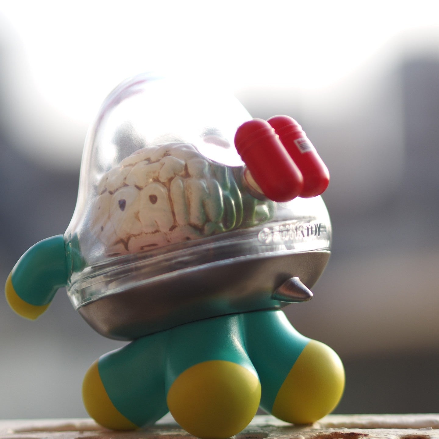 A toy with a brain inside, Mr.Brain - Brains Attacks - Preorder. Material: sofubi / Resin. Size: 9 cm tall. From Strangecat Toys, a blind box and art toy store.