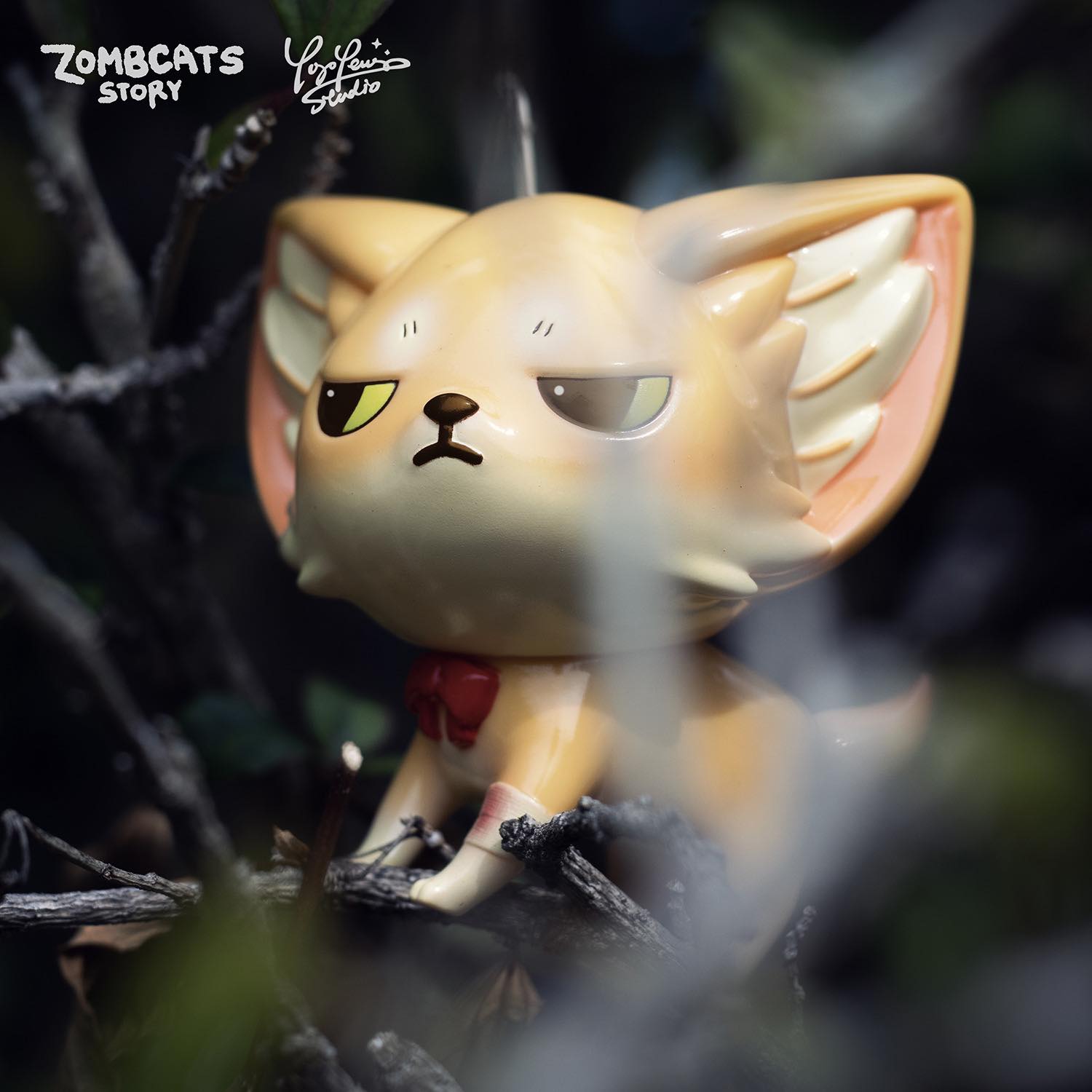 A limited edition Zombcat figurine perched on a tree branch. Soft vinyl, 7cm, limited to 100pcs. By Morimei X Yoyo Yeung Studio. From Strangecat Toys.
