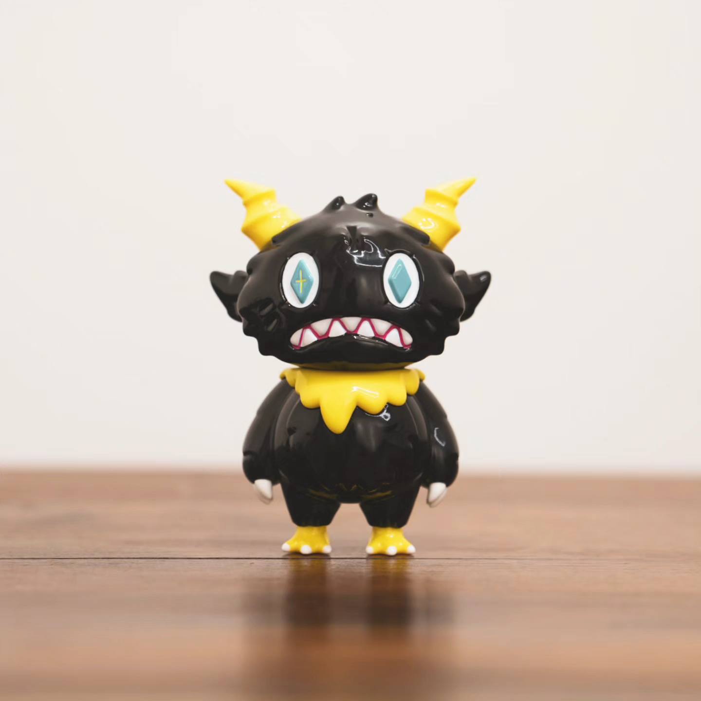 Bobray Black Ver. by ODOM, a 12cm vinyl toy figurine featuring intricate detailing, showcasing a blue diamond element and distinctive design elements.