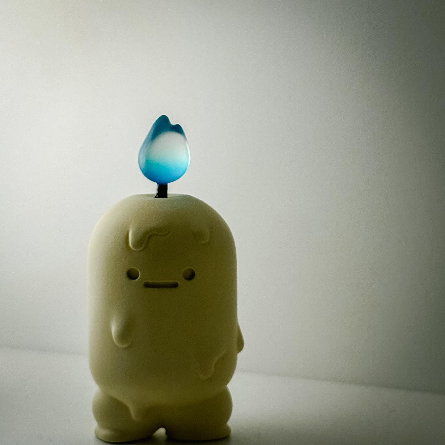 Ghost Candle Shrimp by Crazy Eyes, a 7.5cm resin figure featuring a small white body with a distinctive blue flame on top.