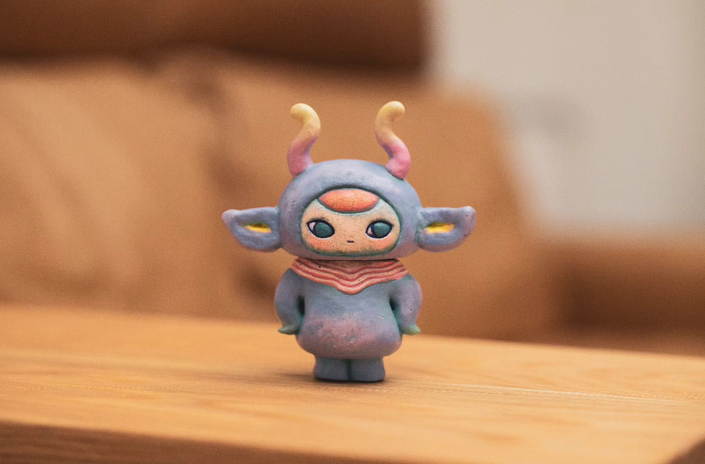 Pucky Dali vinyl figurine, a whimsical art toy featuring cartoonish design and horns, perfect for collectors of unique, blind box toys.