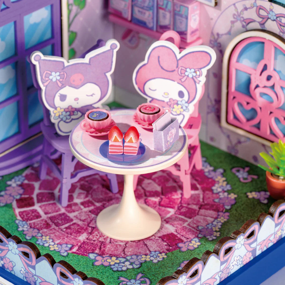 My Melody and Kuromi Tea Party miniature diorama featuring Sanrio characters in a detailed tea-time scene with accessories, ideal for fans aged 14+.