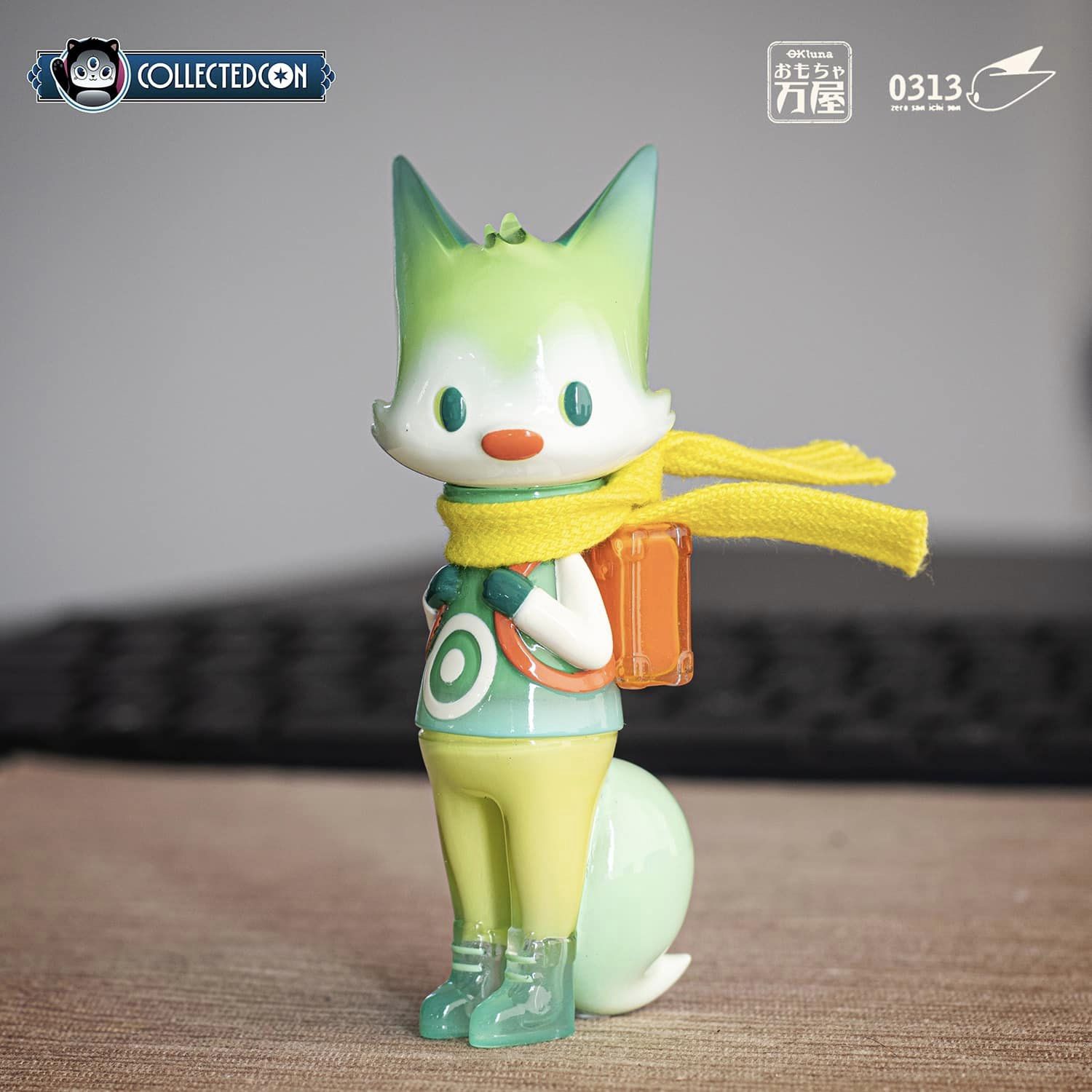 0313 x okluna - Traveler Phase 4: A limited edition, 11cm soft vinyl toy cat figurine with a scarf, part of Strangecat Toys' unique art toy collection.