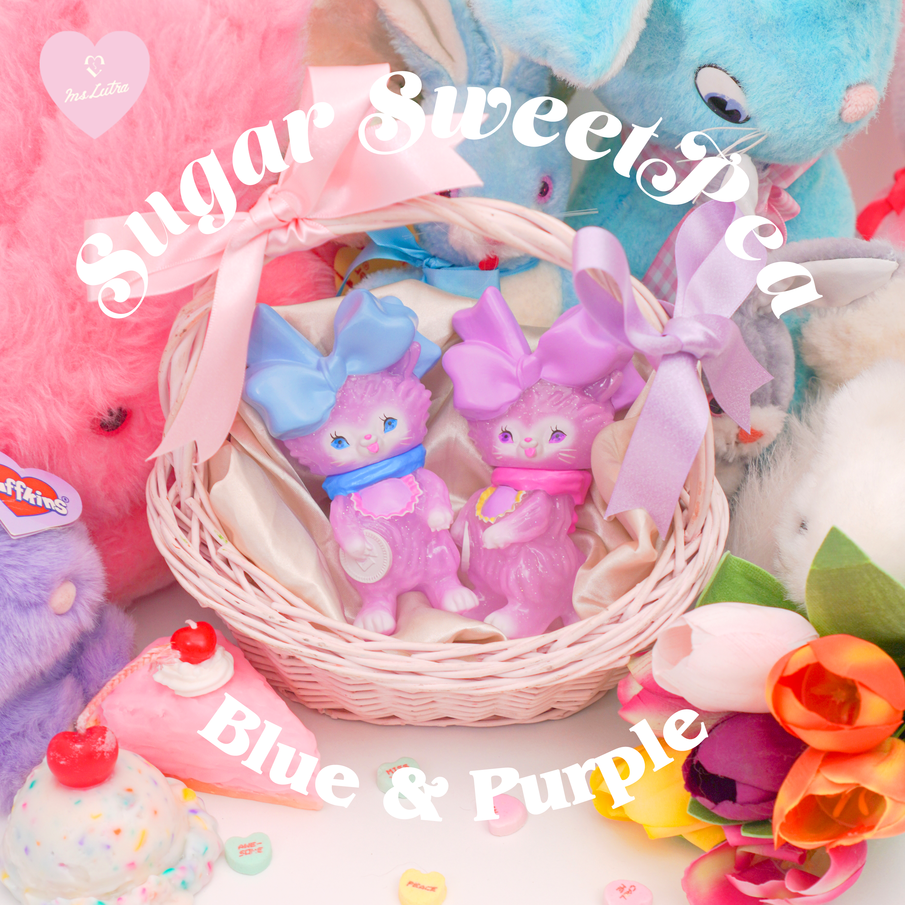 Bab Kat - Sugar Sweet Pea by Ms LUTRA, a 130mm sofubi toy, depicted among playful stuffed animals and flowers.