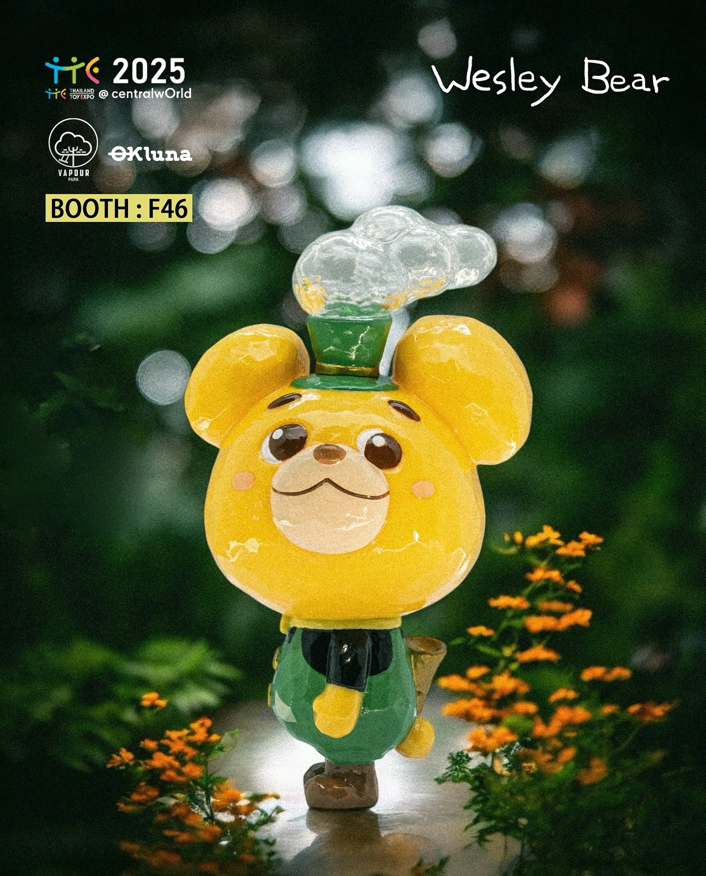 Wesley Bear figurine by Ok Luna, featuring a yellow bear in green pants and hat, adorned with flowers. Preorder available, ships April 2025.