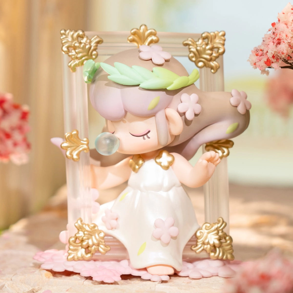 Chibi-style figurine from Nanci's Museum of Fantasy Blind Box Series, featuring lavender hair, floral accents, and a bubble, framed in an ornate setting.