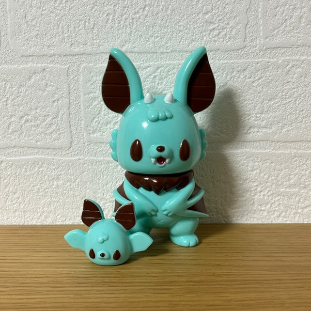 Bat Monster - Chocolate Mint by Chishima Konosuke: A mint-green vinyl toy set featuring a full creature and matching detached head, displayed on a shelf.