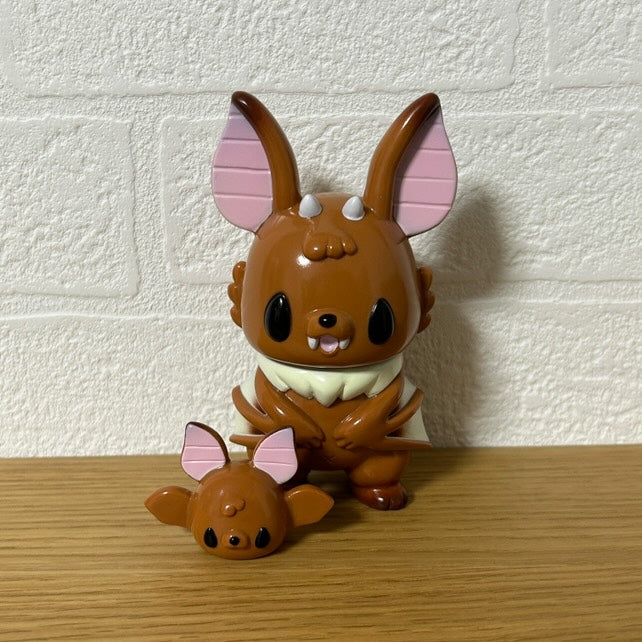 Bat Monster - Wild by Chishima Konosuke: Two collectible figures, one large with folded arms and a smaller headpiece, showcasing Japanese Sofubi design.