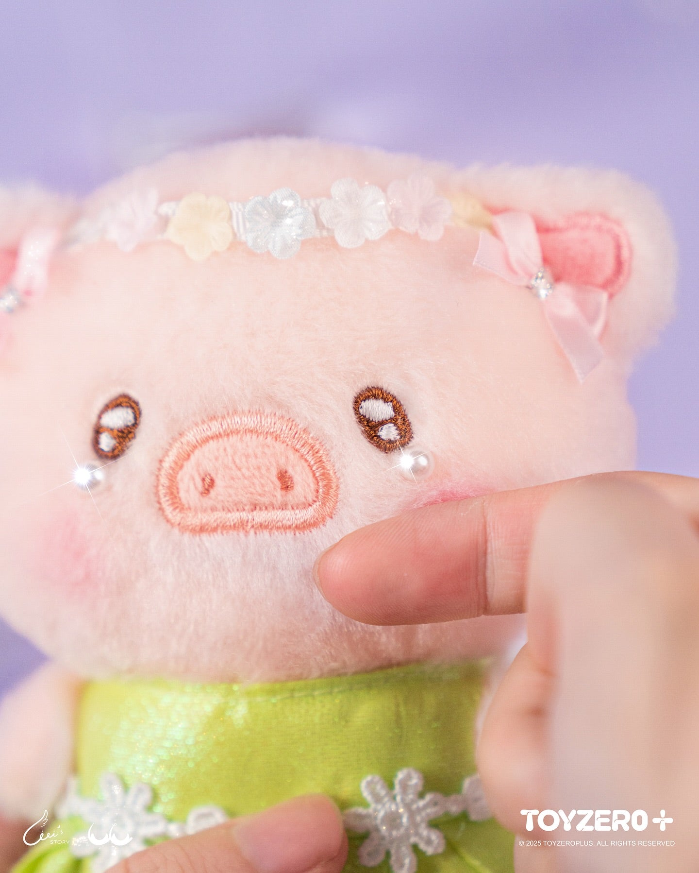 LuLu the Piggy LuLuLand - Flower Fairy Lu Plush Keychain, a small pink plush pig in a green dress with a flower-band headpiece.