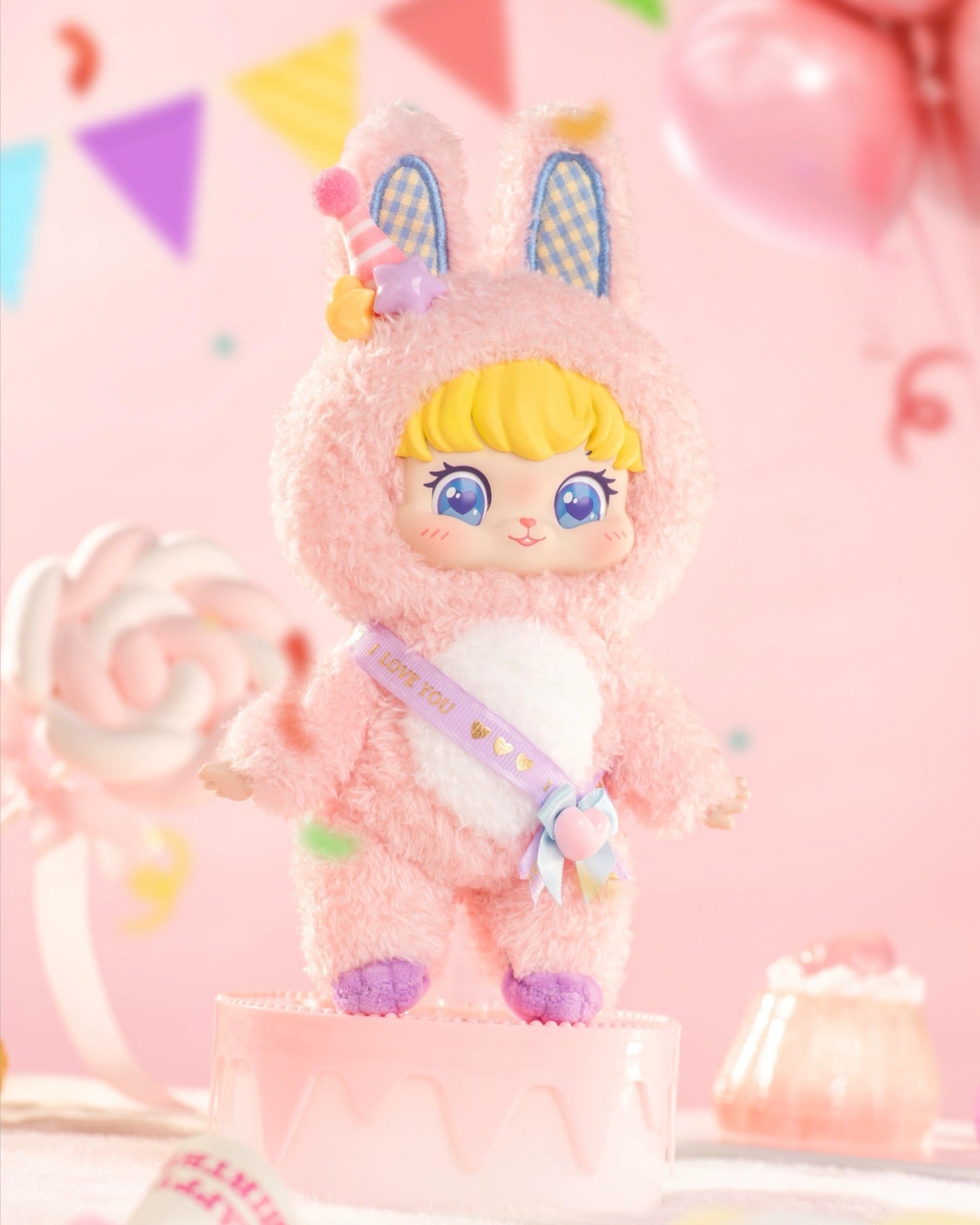 Puffynose Friend Memo Plush Pendant Blind Box: a doll in a pink bunny costume with party hat, purple sash, and whimsical party-themed background.