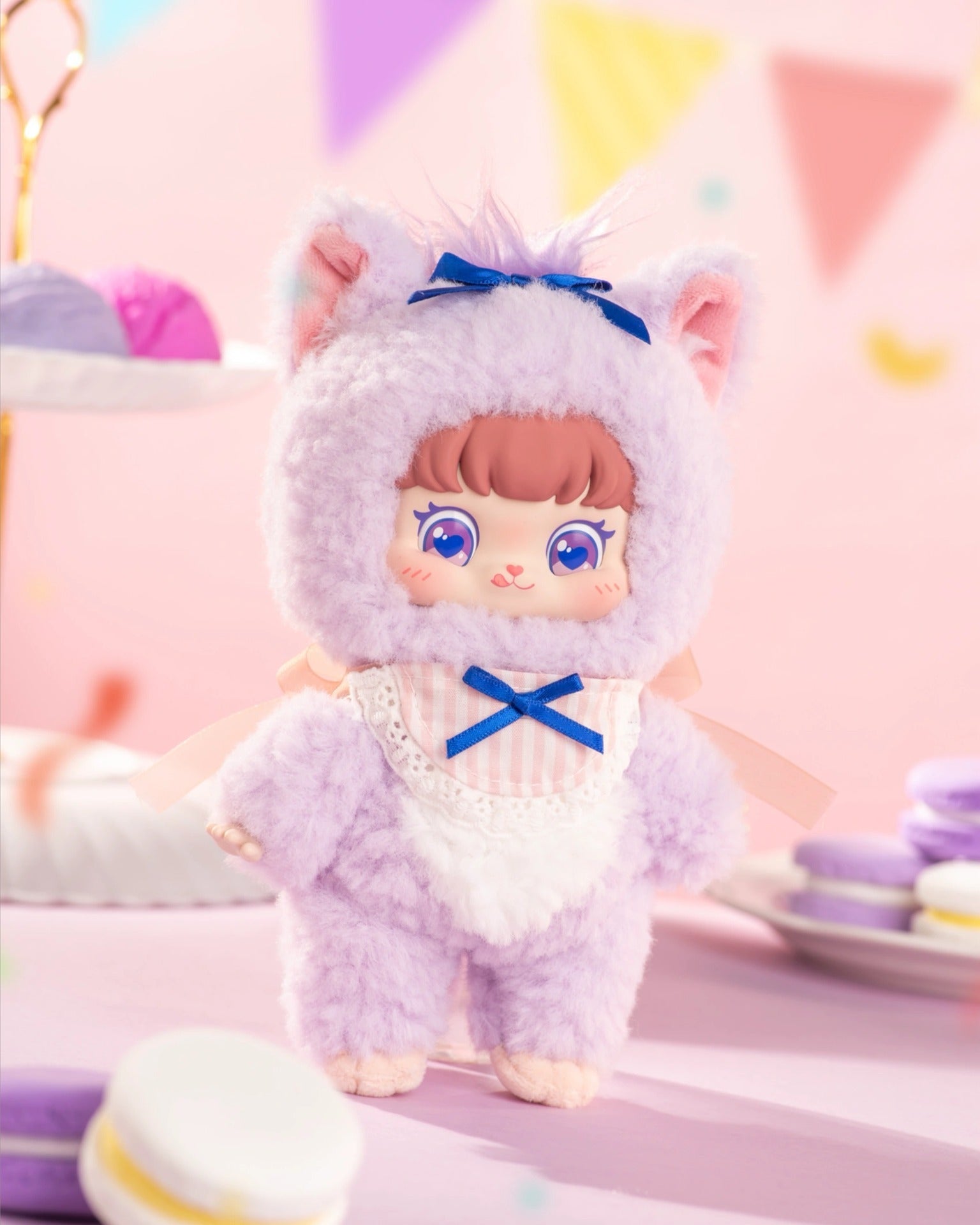 Puffynose Friend Memo Plush Pendant Blind Box features a doll in a lavender animal costume with oversized eyes, amidst pastel macarons. Preorder available.