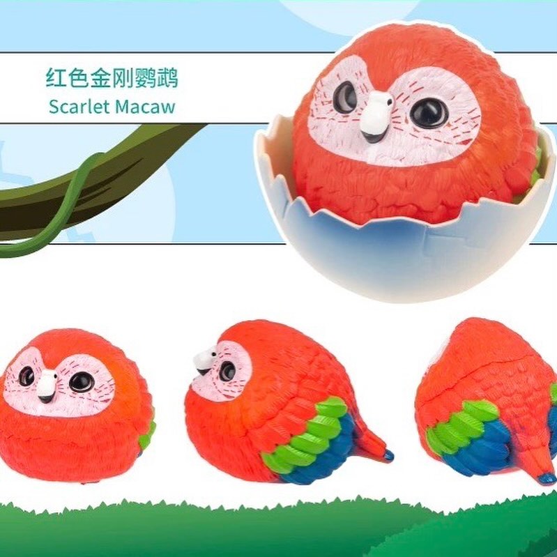 JoJoBirds and Friends 5th-Sprite Island Blind Box: Red Scarlet Macaw toy emerging from an egg, displayed with three angles.