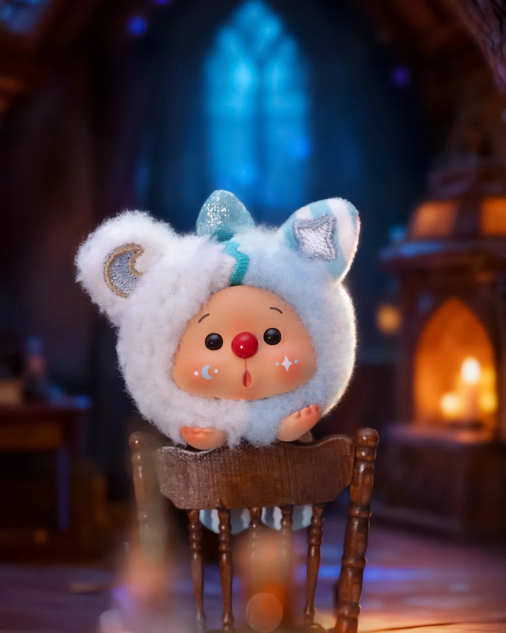 OYO Constellation Story Hipper Series Mini Blind Box figure in a sheep-unicorn romper on a wooden chair, evoking a cozy, storybook ambiance.