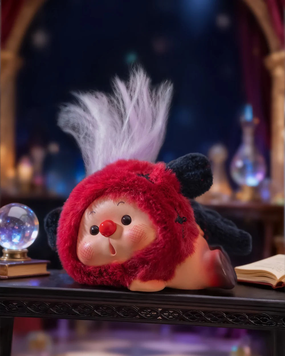 OYO Constellation Story Hipper Series Mini Blind Box: A rosy-cheeked figurine in a magical setting with a crystal ball and open book.