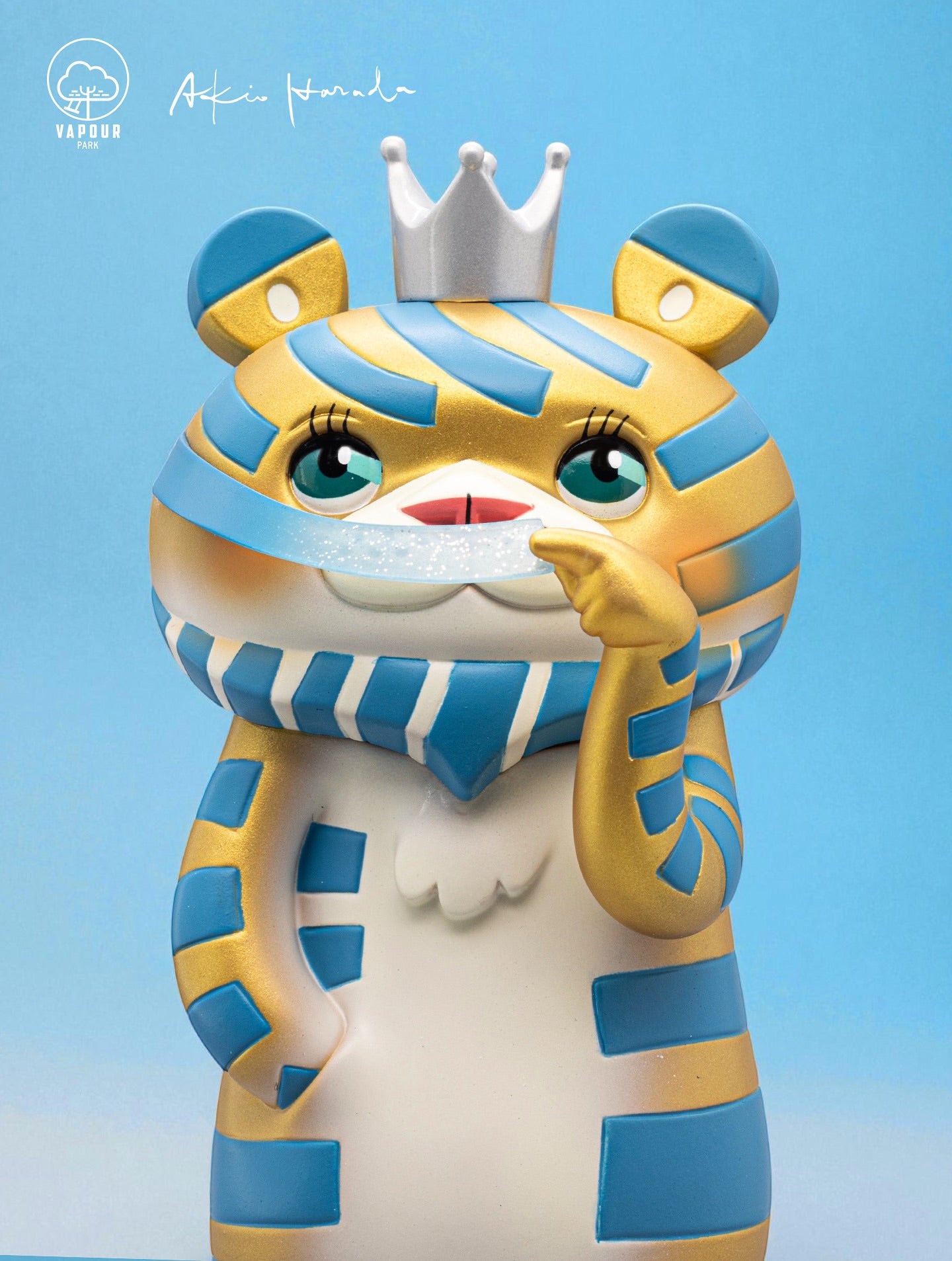 Bearded Tiger 6th Colorway by Akio Harada & Vapourpark: Metallic collectible figure with crown, lifting sparkly strip, available for preorder at Strangecat Toys.