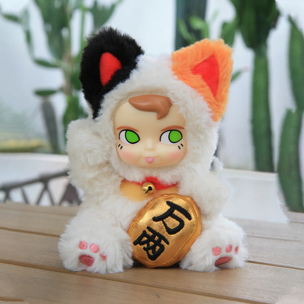 SAMSAM FORTUNE CAT PLUSH Blind Box: A plush toy mimicking a lucky cat, with embroidered gold coin, green eyes, and distinct ear colors.