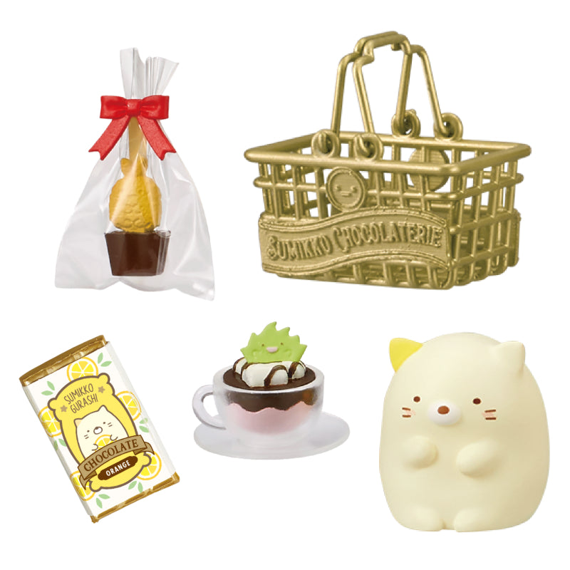 SUMIKKO CHOCOLATERIE Re-ment Blind Box Series featuring miniatures: chocolate pear, shopping basket, orange-flavor wrapper, hot chocolate, and Shirokuma figure.