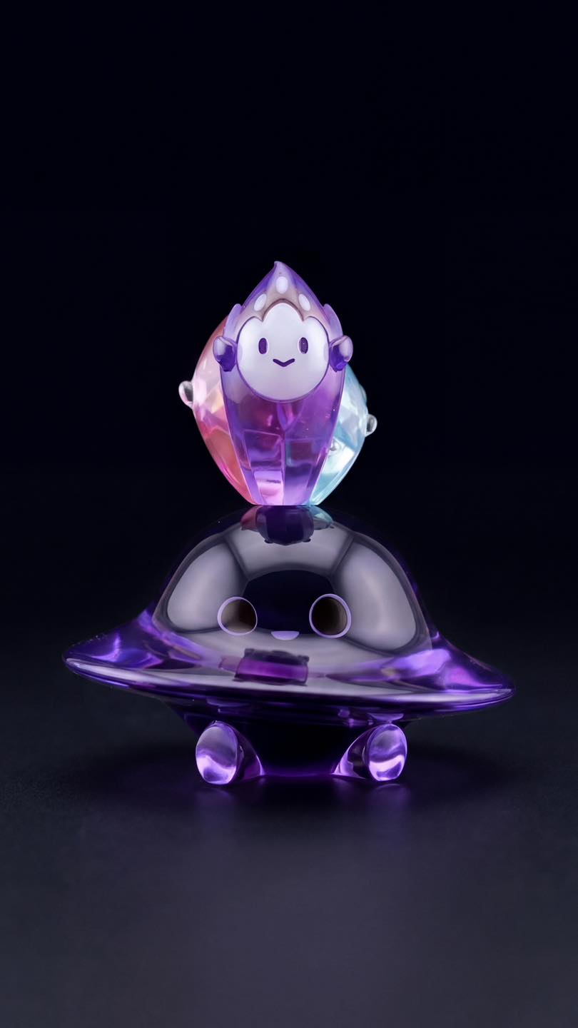 Flamey & Darkmite: Ember Void by MUPA x Yutoos, a two-piece resin art-toy set featuring a UFO-shaped creature and faceted crystal character, limited edition of 70.