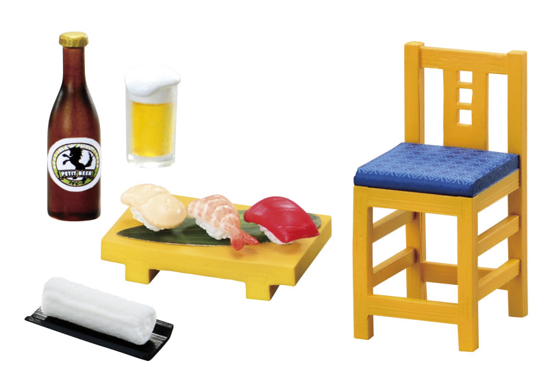 Wait for me! Downtown's human sushi Re-ment Blind Box Series on a table with a beer bottle and yellow chair nearby.