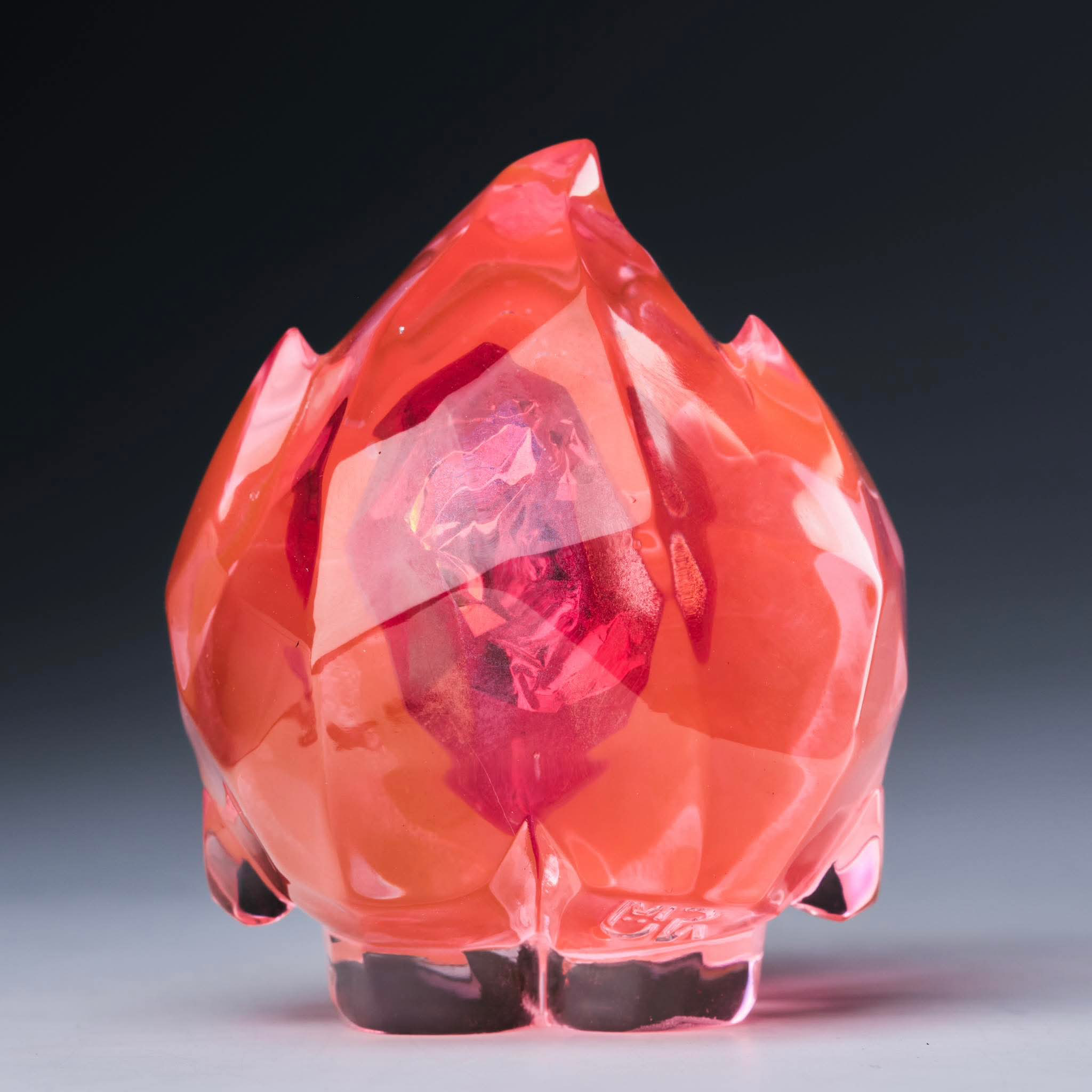 FLAMEY FROST by MUPA Toy - Preorder: A translucent red, faceted resin sculpture, resembling a stylized flame, limited to 100 pieces, measuring 7cm.