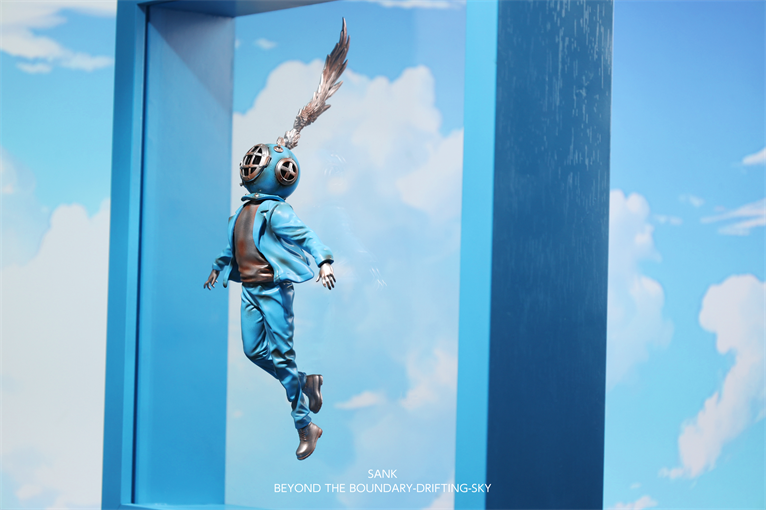 Sank-Beyond the Boundary-Drifting-Sky: A surreal 3D art toy of a floating figure in teal with a brass diving helmet, crafted from resin.