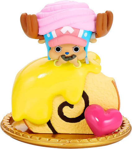 Tony Tony Chopper figurine perched on a dessert roll cake from zZoton Winter's Small Joys Series Plush Blind Box, featuring vinyl material and artist-designed details.