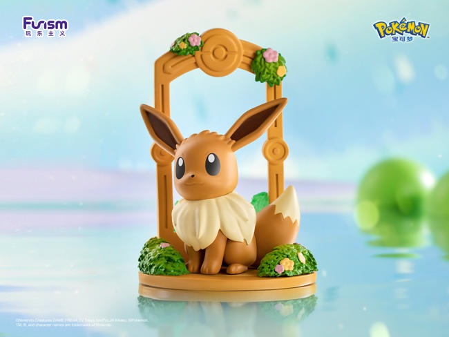 Toy animal figures from Let's go! Eevee Blind Box Series, including a rabbit on a swing and a green object, part of a blind box collection.