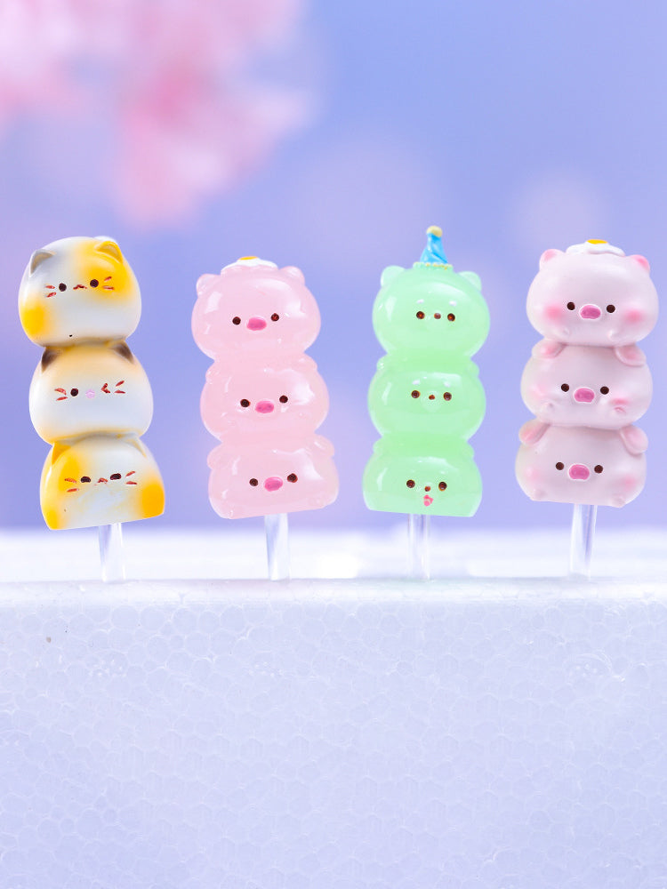 Street Snacks Blind Box Series: A group of small animal, candy, snowman, and toy figurines on sticks and close-up views.