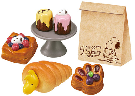 SNOOPY'S BAKERY Re-ment Blind Box Series featuring pastries and a cartoon-themed bag, showcasing 8 unique toy designs for collectors.