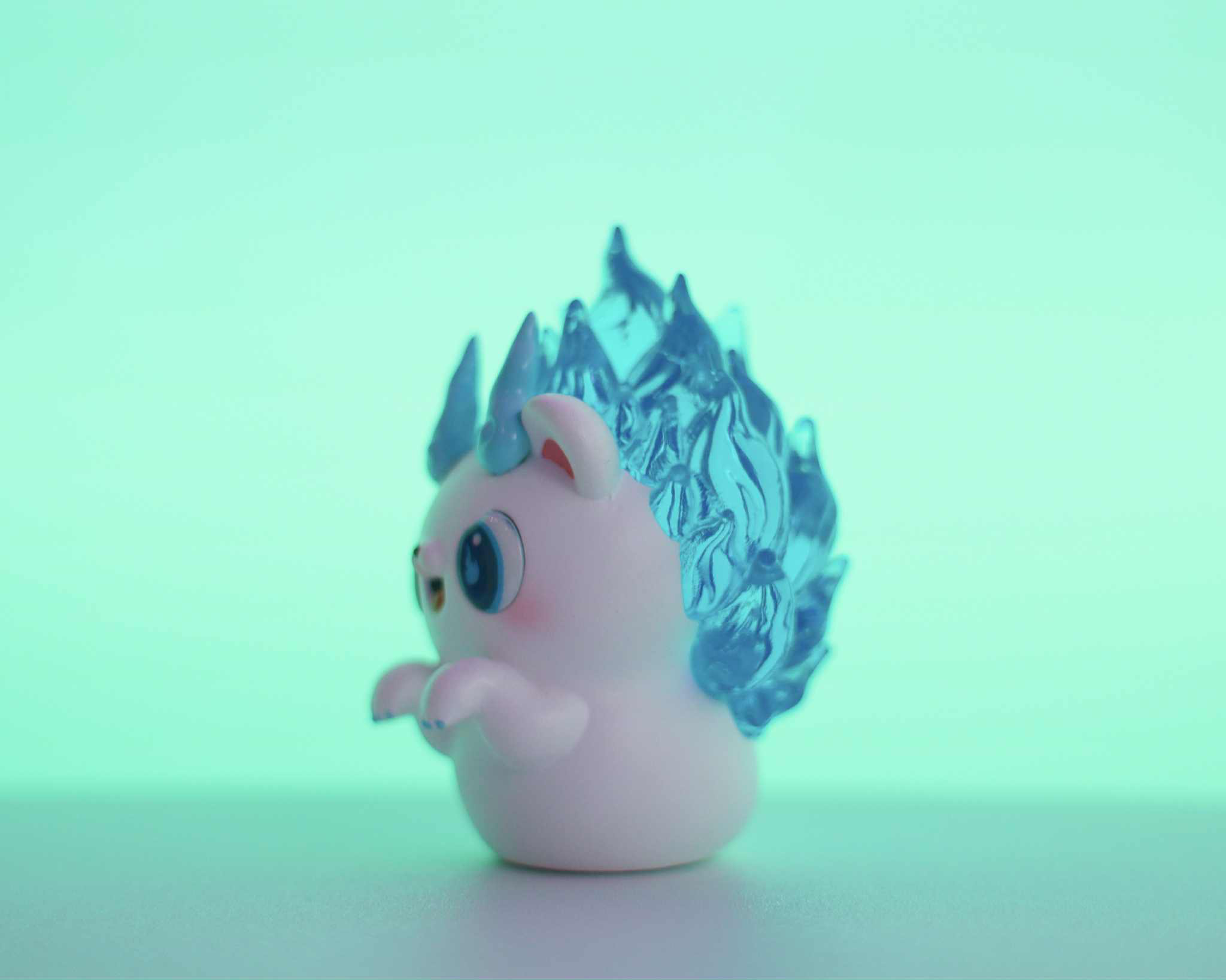 Soul Hogkey Blue Spirit by Tangent, a 9 cm resin vinyl figure, features a unicorn horn and icy-blue mane, ideal for collectible art toy enthusiasts.