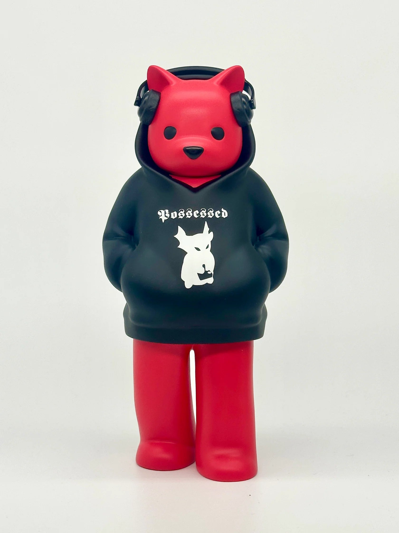 Low Fidelity - The Devil Likes Lofi by Luke Chueh: Red vinyl figure with bear/cat ears in a Possessed hoodie, headphones; inspired by lofi music, limited to 250 pieces.