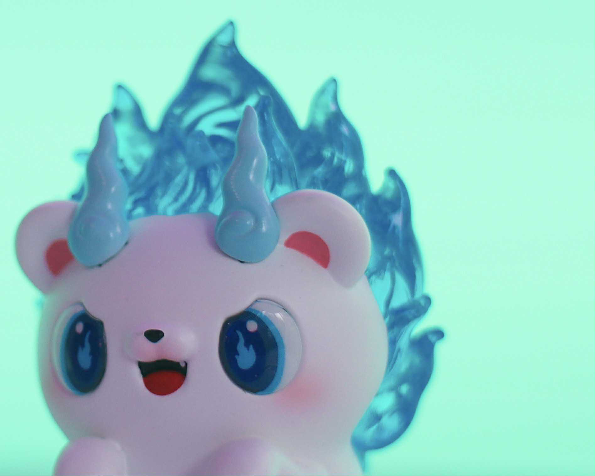 Soul Hogkey Blue Spirit by Tangent, a 9 cm resin toy, features a pastel-pink bear-like form with blue flaming mane and horns. Preorder for Nov 2025.