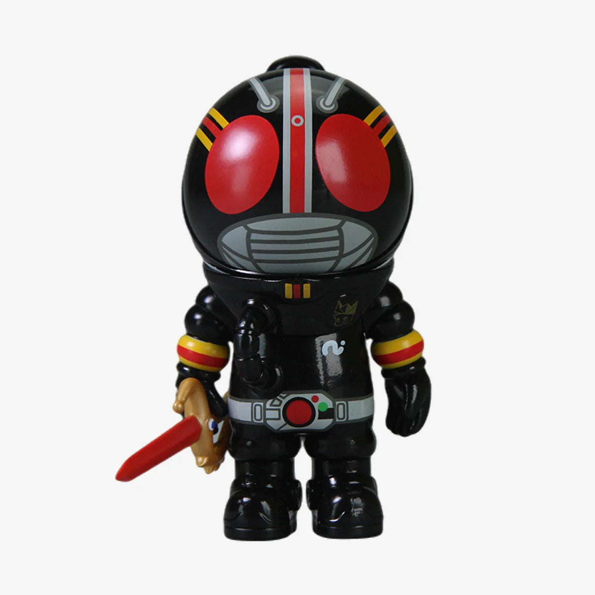 SAMSAM ADVENTURER X KAMEN RIDER BLIND BOX: A glossy black vinyl toy with red eyes, antennae, and a red-bladed gold ring accessory.