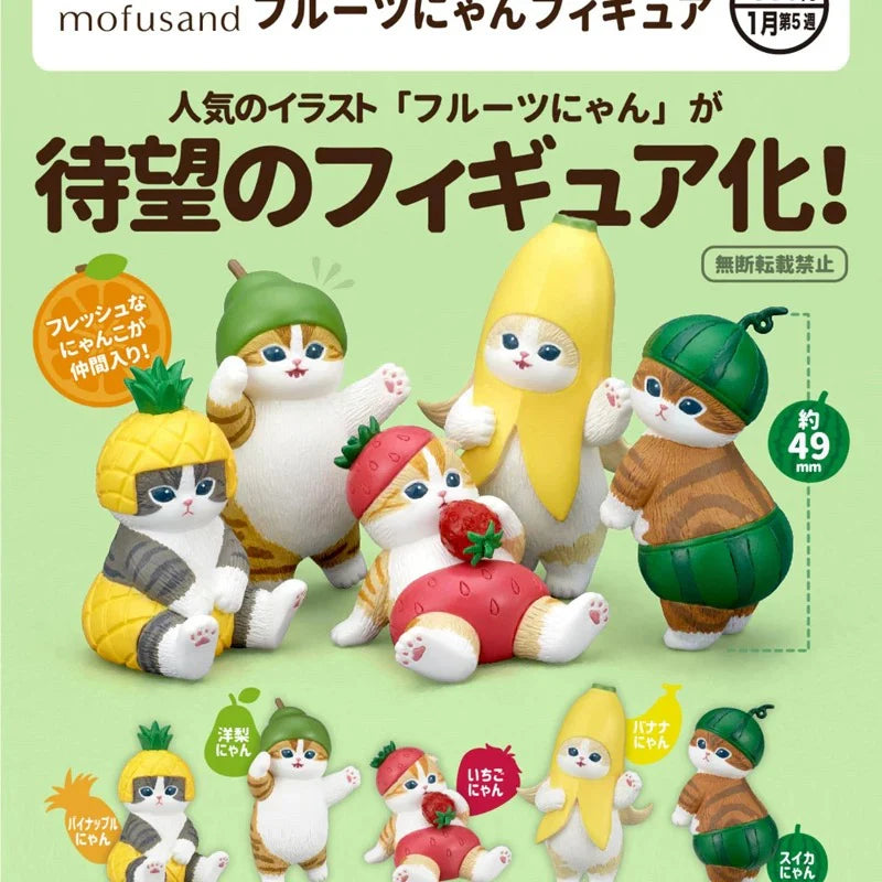 Mofusand Fruit Nyan Figure Gacha featuring cat figurines in fruit-themed outfits, including a strawberry, banana, and pineapple.
