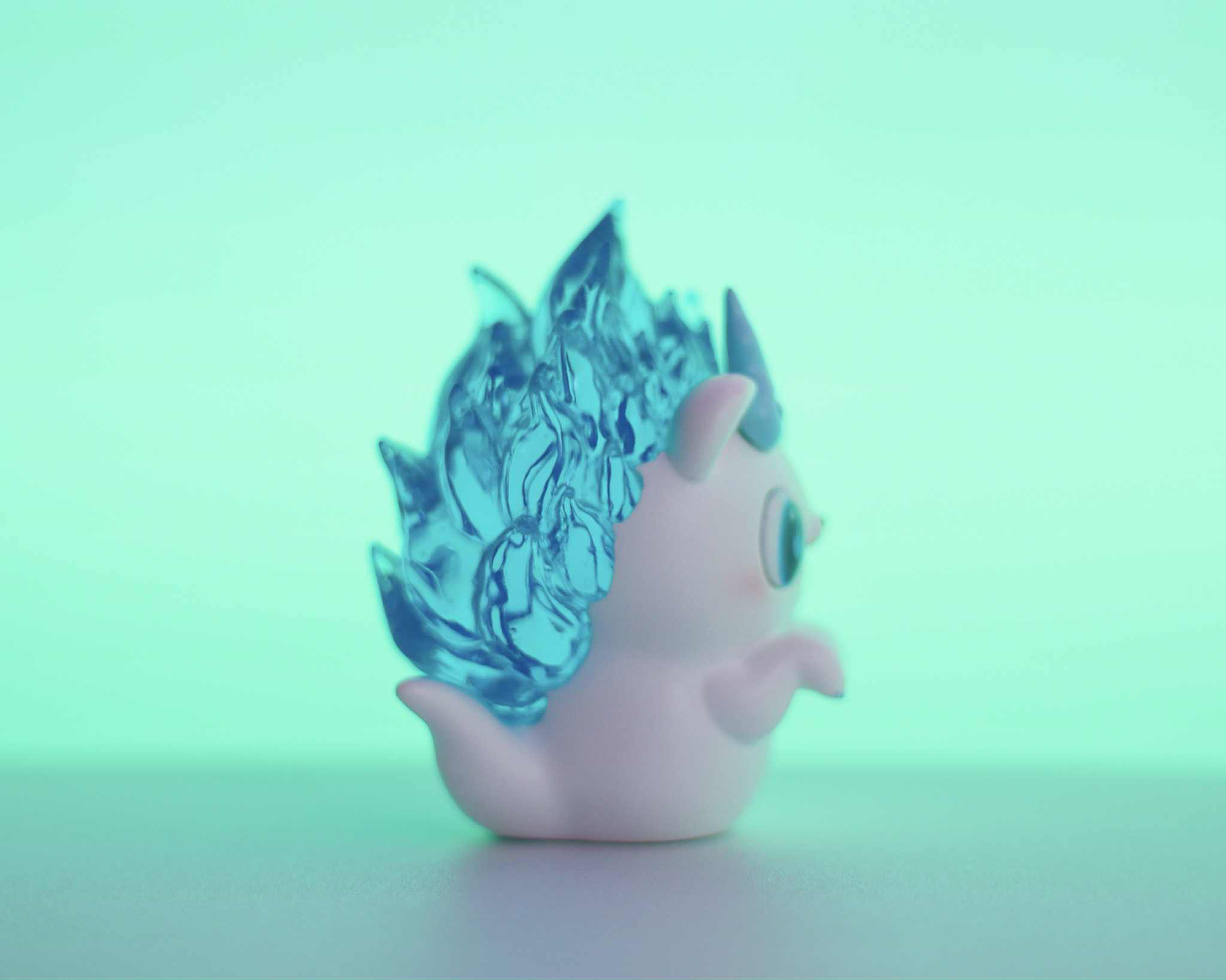 Soul Hogkey Blue Spirit by Tangent, a 9 cm resin figure, features a pink body with blue crystalline fins, perfect for art toy enthusiasts.