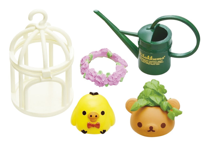 Rilakkuma Longing British Tea Time Re-ment Blind Box Series featuring toy designs, including a bird cage and watering can, reflecting the series' whimsical charm.