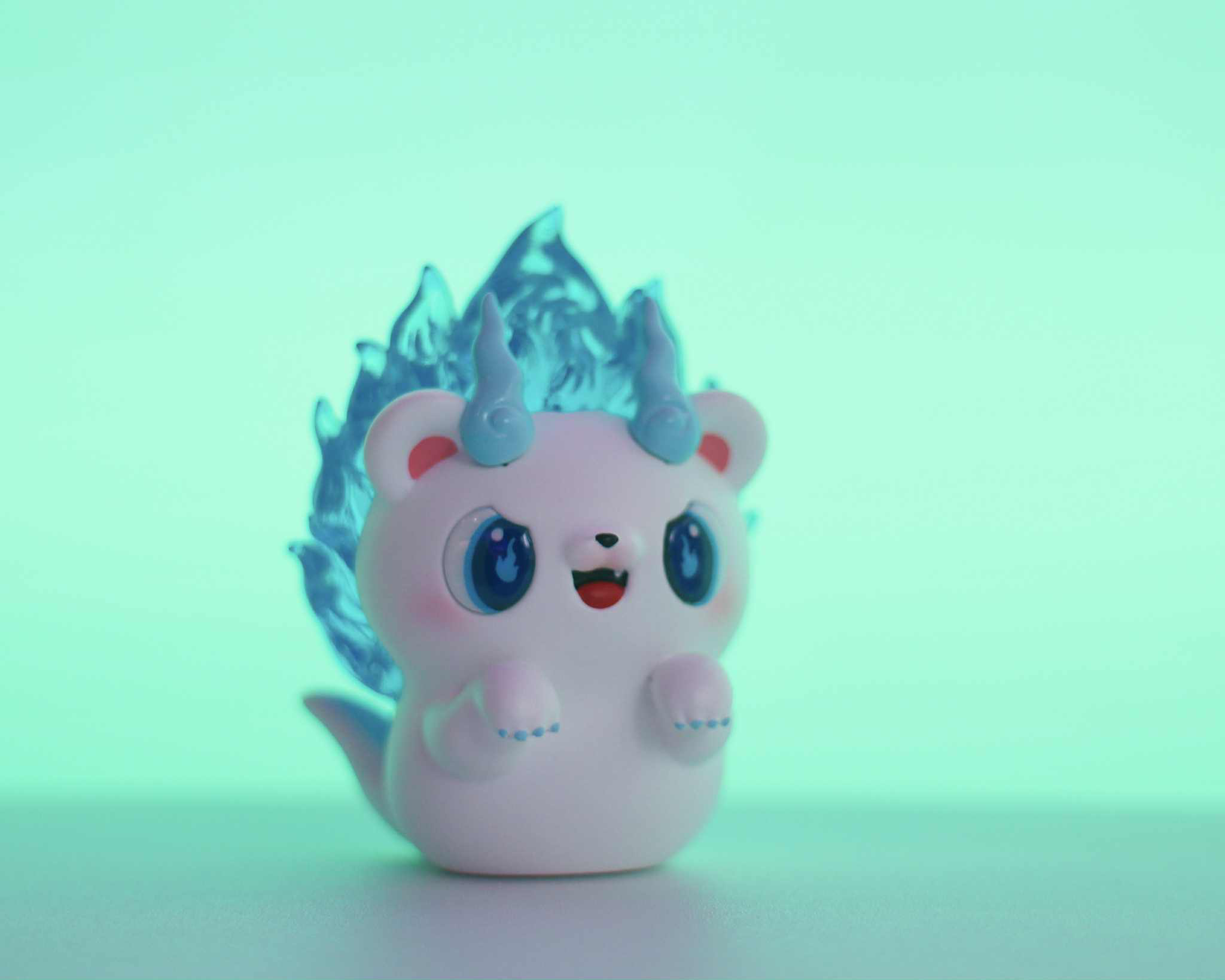 Soul Hogkey Blue Spirit by Tangent: A 9 cm resin toy with glossy blue eyes, pink cheeks, and spiraled horns, featuring a playful translucent blue mane.