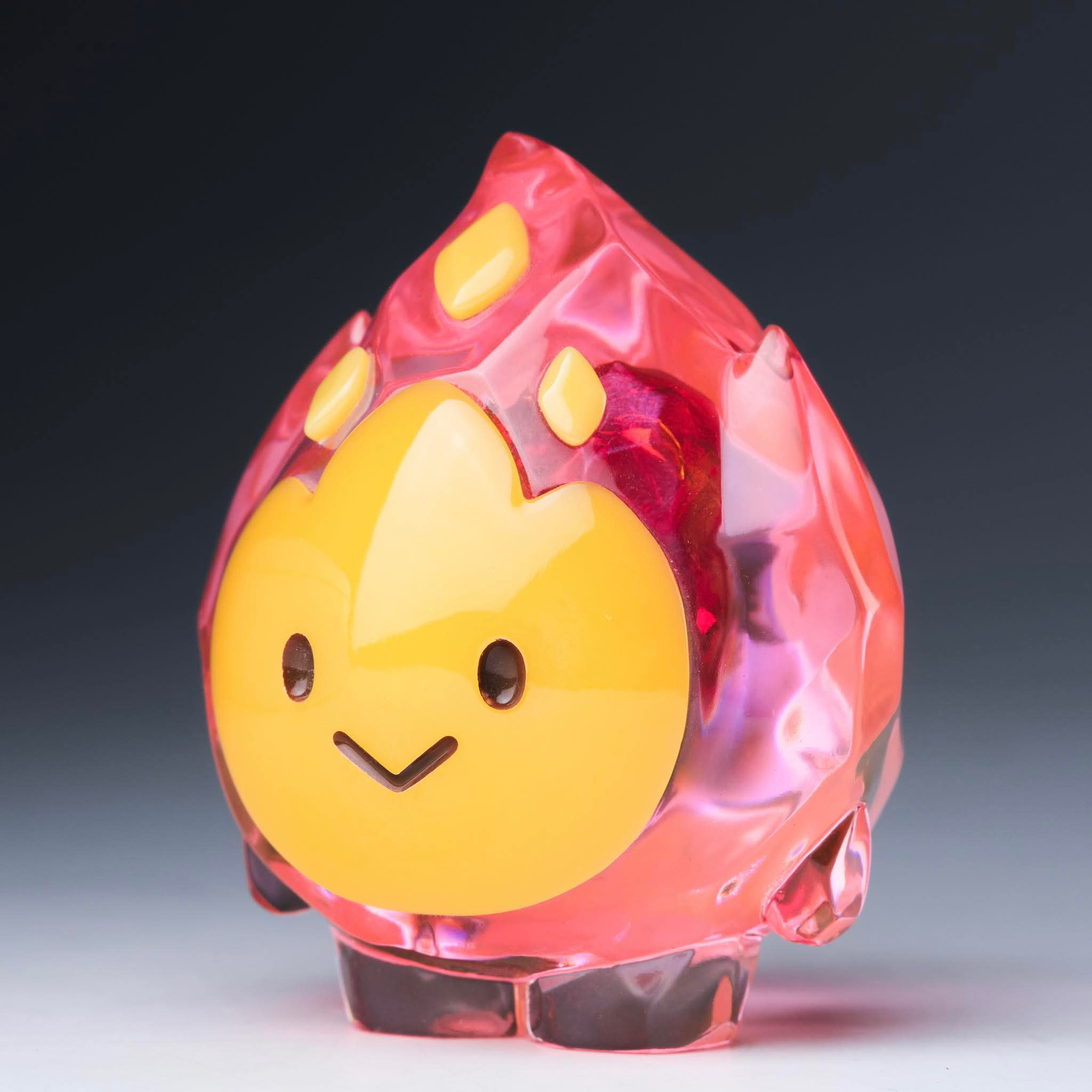 FLAMEY FROST by MUPA Toy - Preorder: A 7cm resin designer toy, shaped like a flame with a smiling face, limited to 100 pieces.