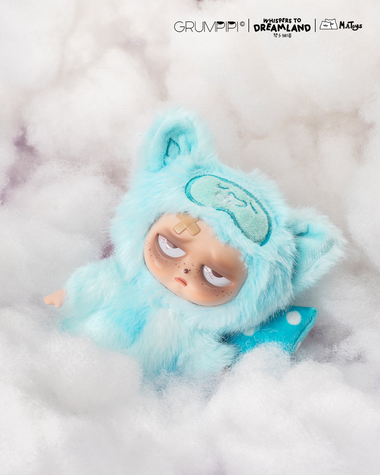 Sleepless Grumpipi Whispers to Dreamland Plush Blind Box Keychain nestled in cloud-like stuffing, showcasing a grumpy vinyl figure in a fluffy onesie with dreamy details.