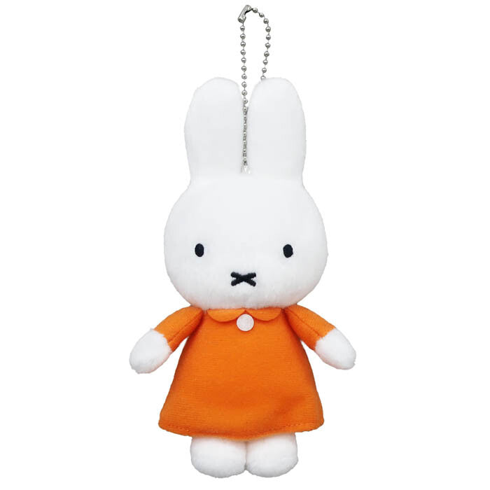 Miffy Orange Dress Keychain: a plush, white stuffed animal wearing a dress, sized H9.5 x W6.3 x D2.5cm, perfect for fans of art toys.